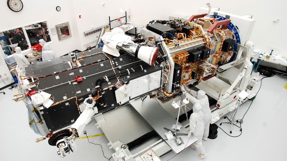 DigitalGlobe employees working on a satellite