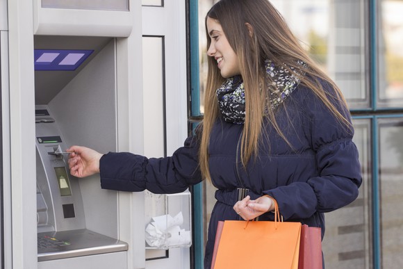 Woman using an ATM