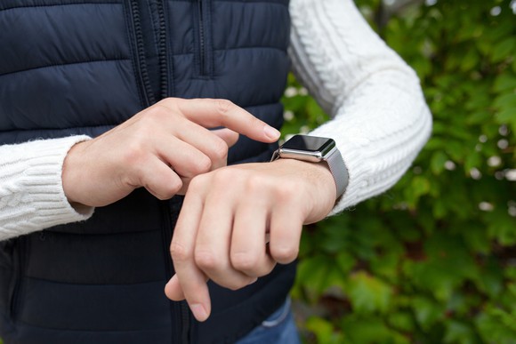 Man wearing smartwatch.