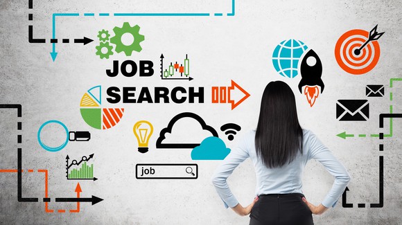 A woman looks at a diagram of a job search.