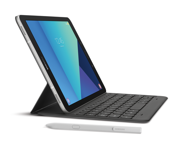 A Samsung tablet with an attached keyboard and a stylus next to it.