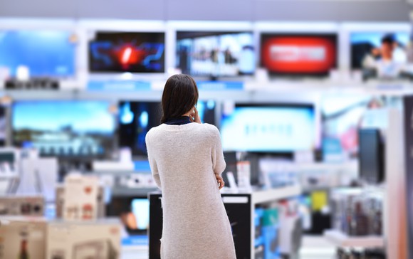 Woman in electronics store