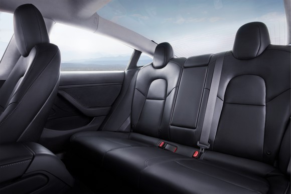 The back seat of a Model 3.