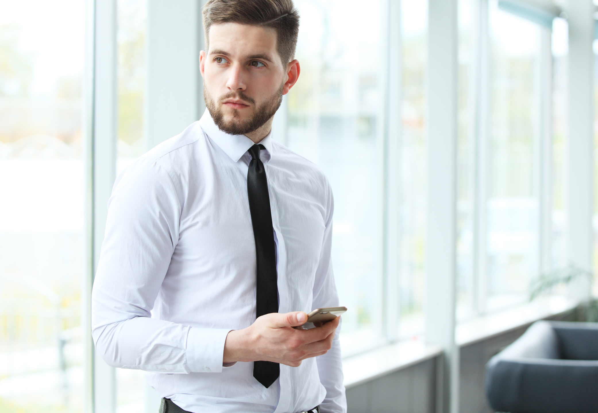 Man in dress shirt and tie