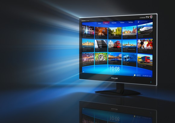 A TV showing an internet television interface with a blue light in the background.