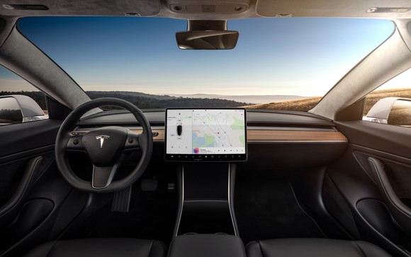 The Model 3 interior, including its 15-inch center touchscreen