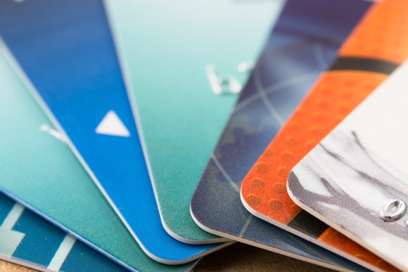 Close up of several credit cards fanned out.