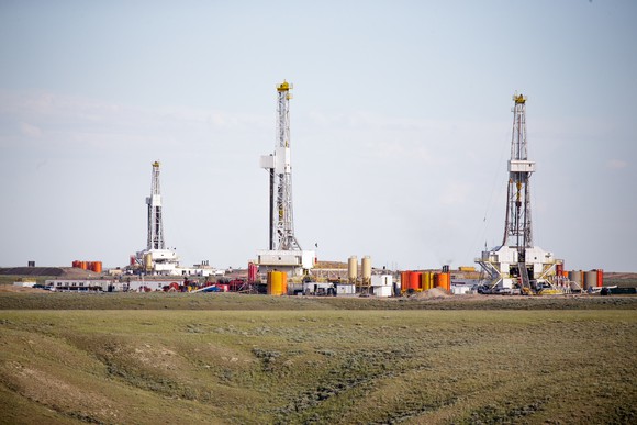 Multiple drilling rigs in a field