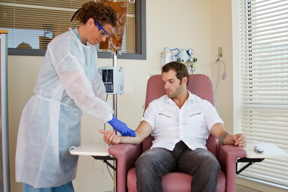 Nurse preparing a patient for an infusion