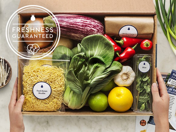 Box of ingredients for a meal delivery kit from Blue Apron.