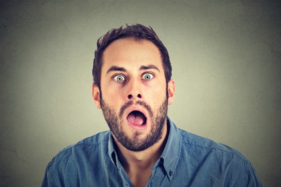Man with beard, amazed, mouth agape
