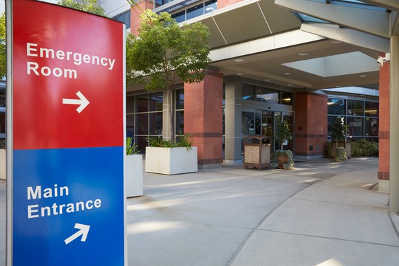 Sign for emergency room and main hospital entrance.