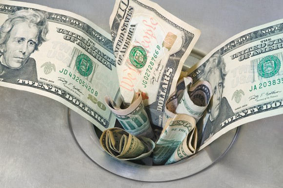 Bills stuffed in a drain