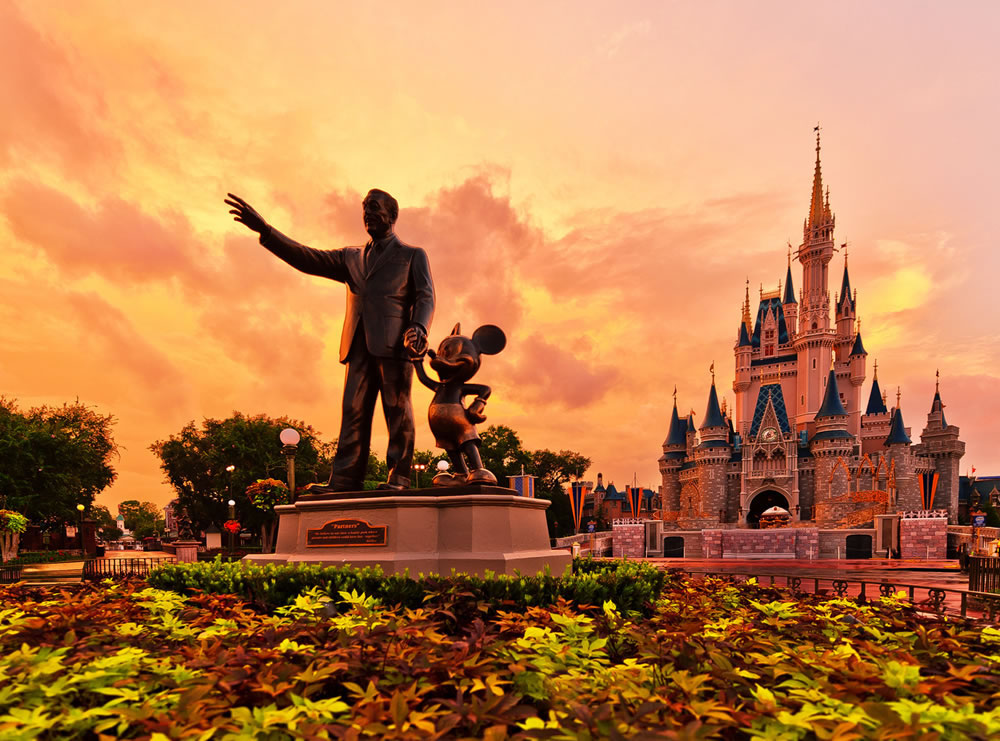 A statue of Walt Disney and Mickey Mouse at Walt Disney World in Orlando, Florida.