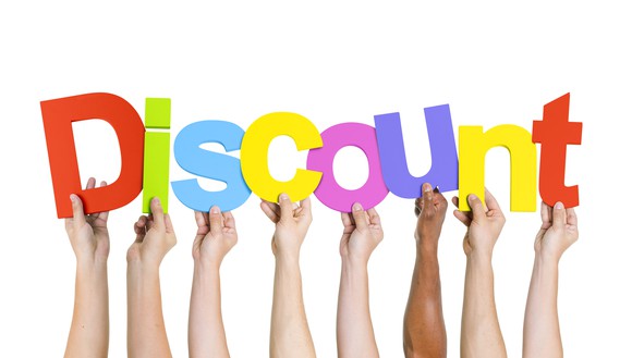 Letters held up by many hands to spell the word discount