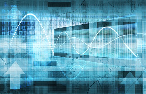 Digital picture of a up-and-down stock chart super-imposed over a computerized building.