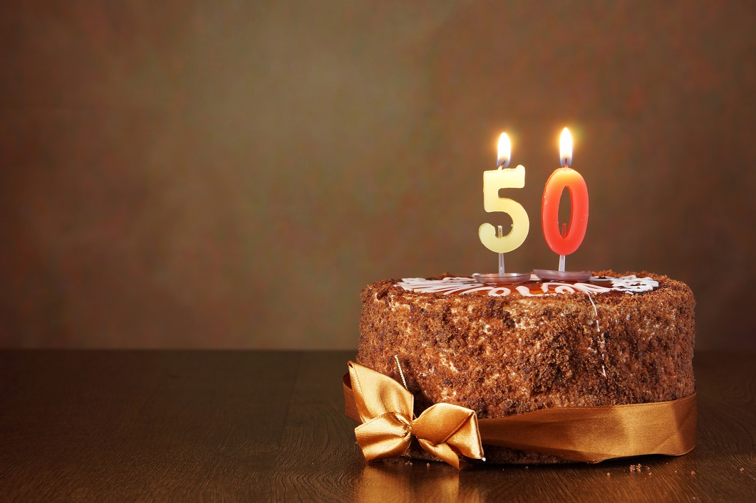 Chocolate cake with number 50 candles.