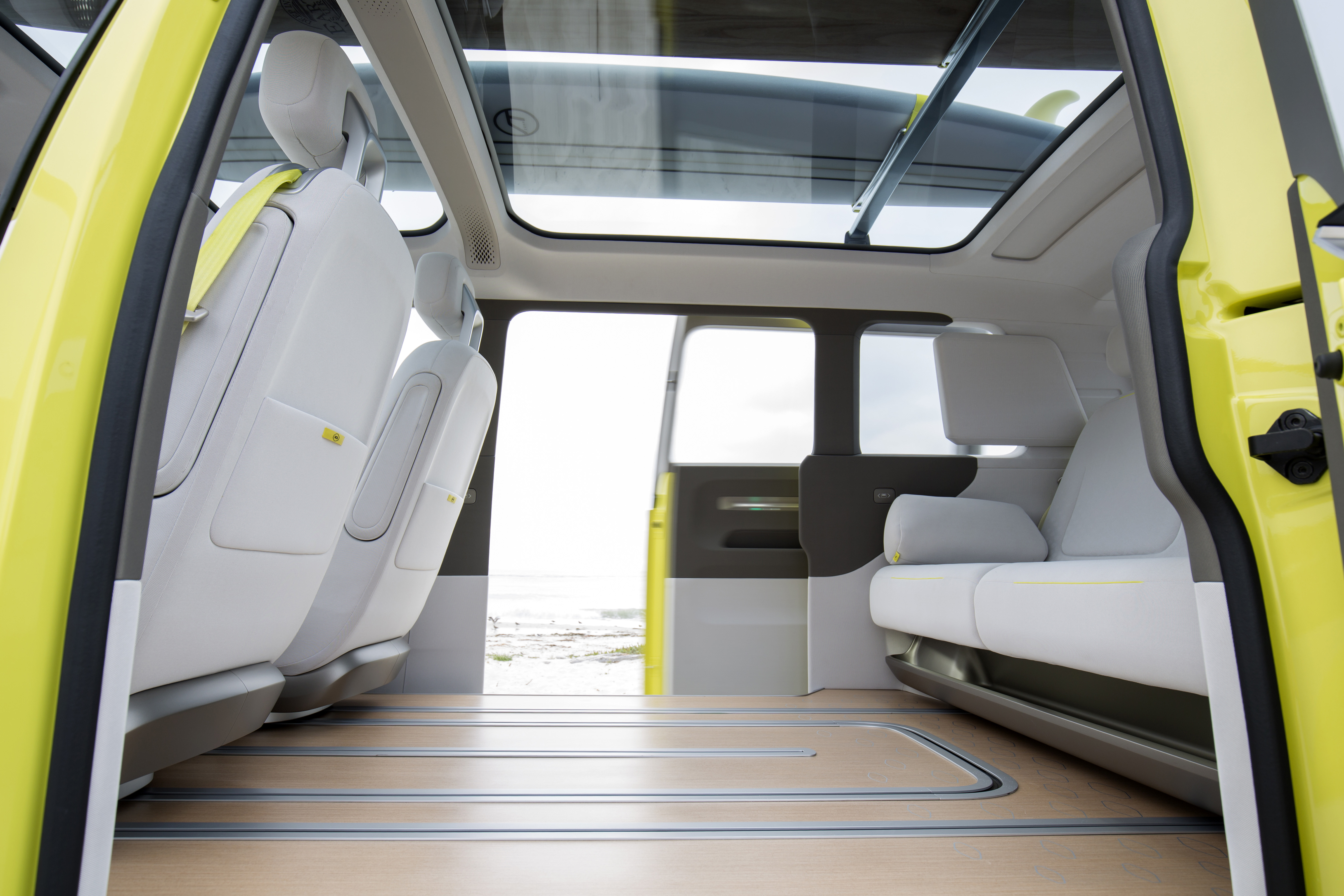 A view of the I.D. Buzz's interior, showing a large space between the first and second rows of seats.