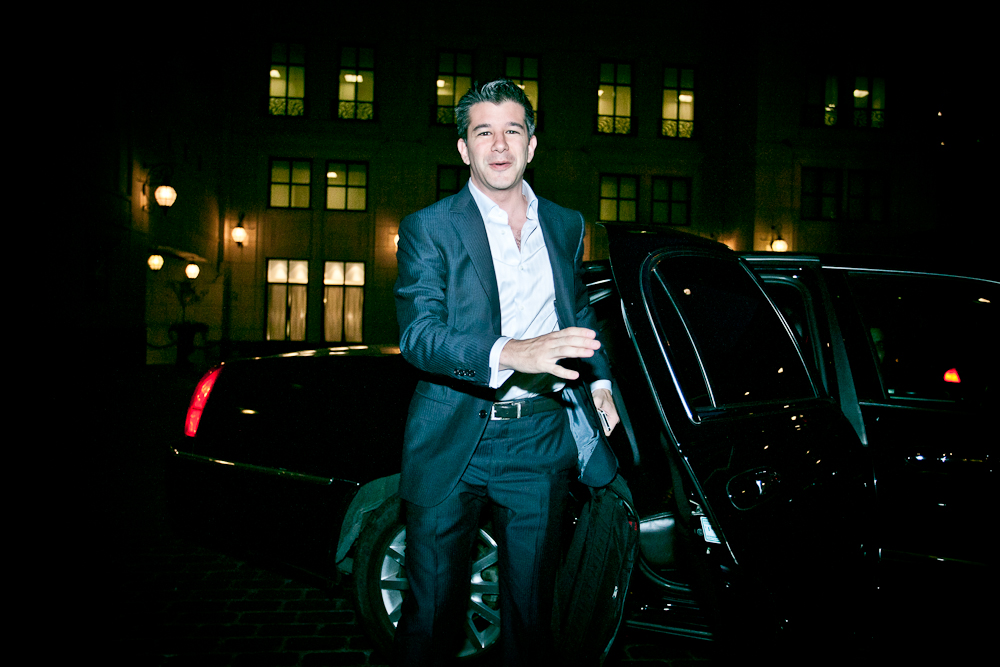 Kalanick is shown exiting a car at night in Chicago.