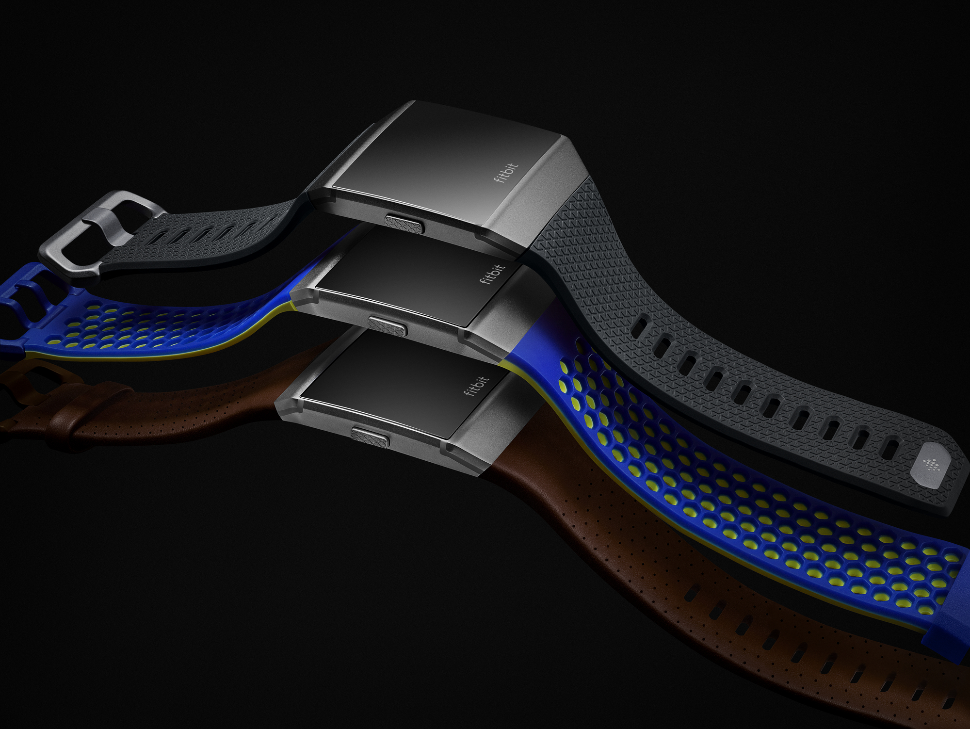 Three Ionic smartwatches with different color configurations