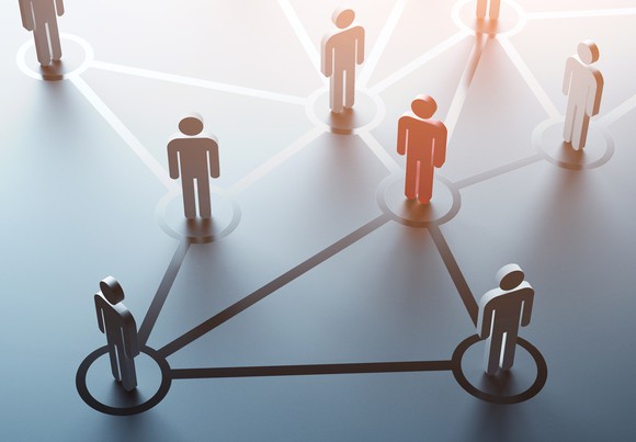 An illustration using cutouts who are shown to be connected.
