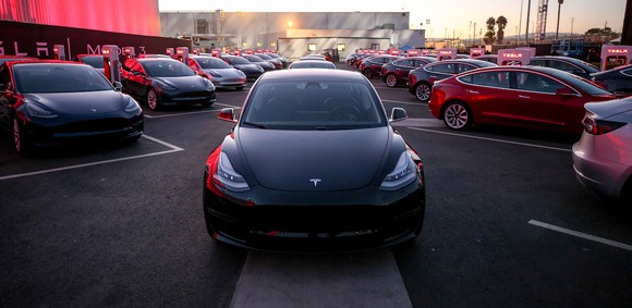 A parking lot full of Tesla Model 3s