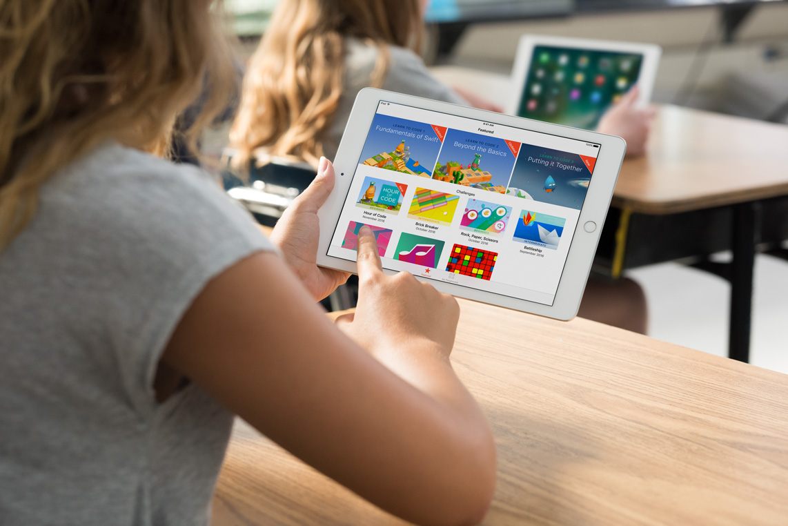 A student using an iPad. 
