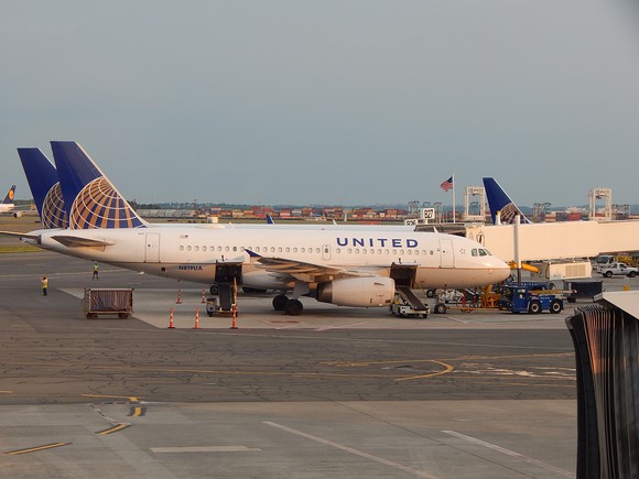United Airlines planes at their gates