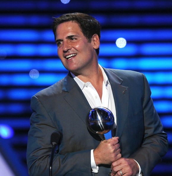 Mark Cuban holding Espy Award for Best Team in 2011