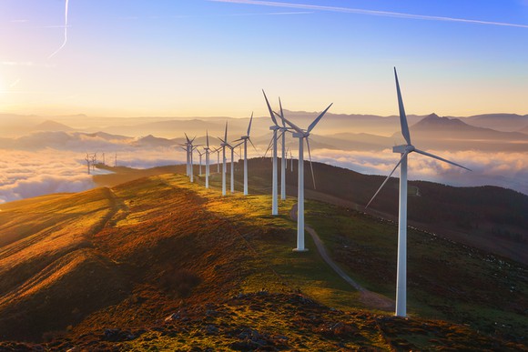 Wind turbines along a ridge line.