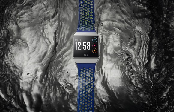 A smartwatch against a background suggesting water