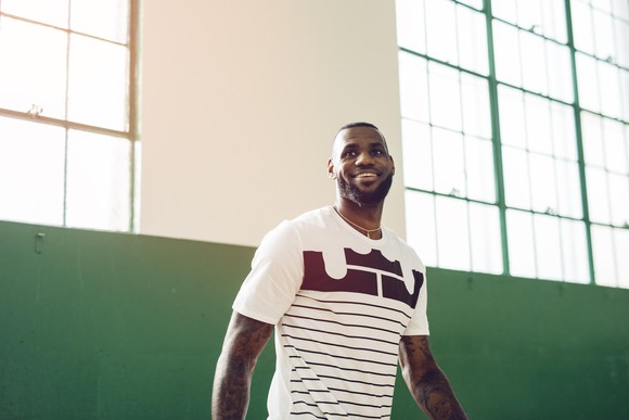 Lebron James smiling in street clothes