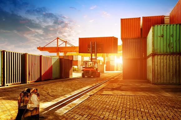 A container terminal at dusk.