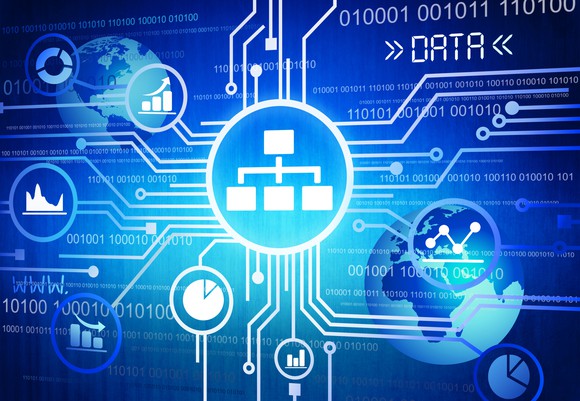 A blue artist rendition of digital data being created and stored by computers.