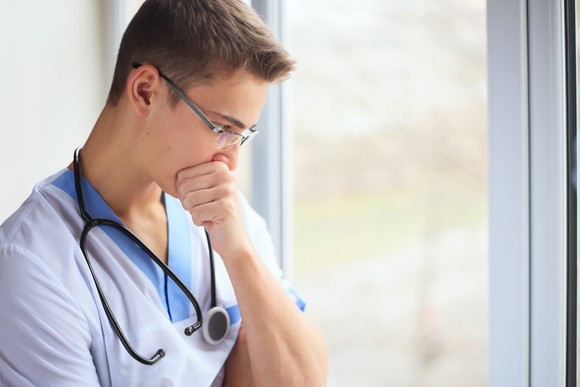 A medical professional looking concerned.