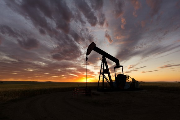 An oil pump at sunset.