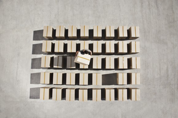 Man arranging boxes