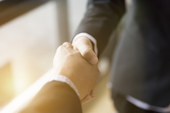 Two people shaking hands