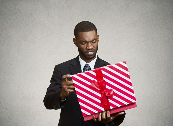 A man opening up a package