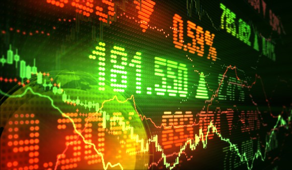 Stock market data in red and greed on an LED display