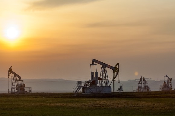 Oil pumps on a foggy morning.