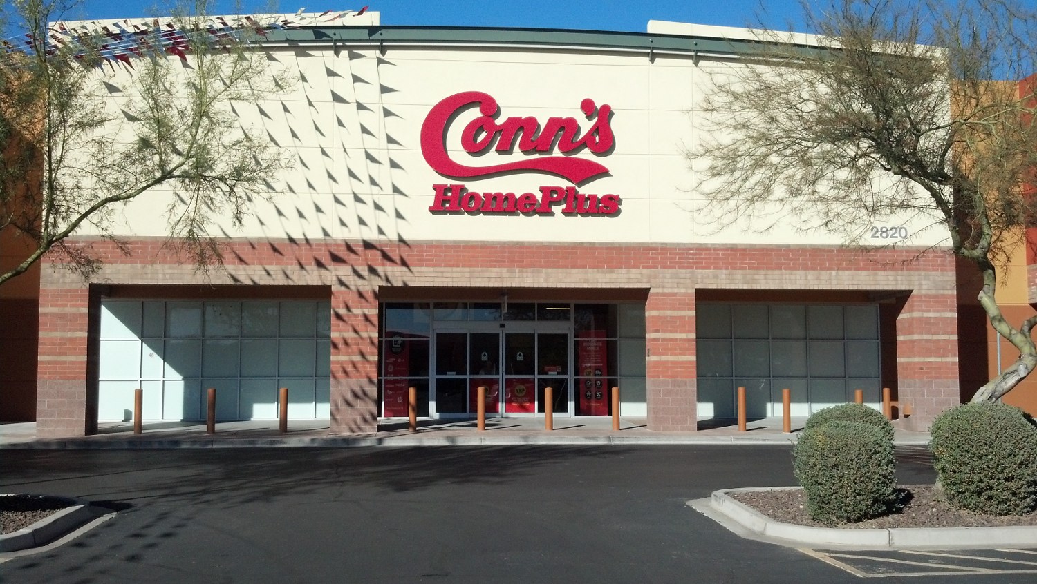 The exterior of a Conn's Home Plus store.