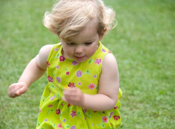 Toddler running on grass