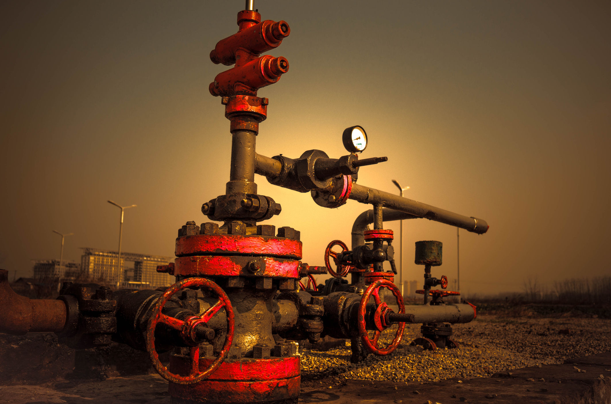 A gas well at sunset.
