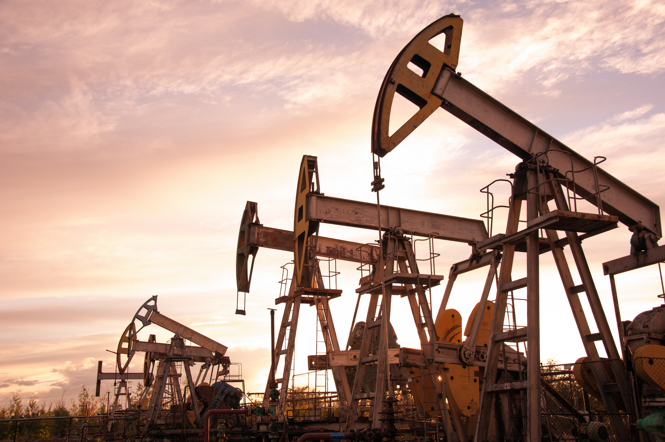 Oil pumps with a gray sky.