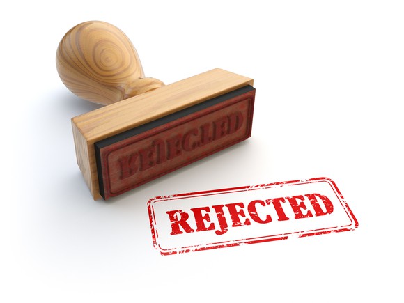 A rubber stamp that reads rejected.