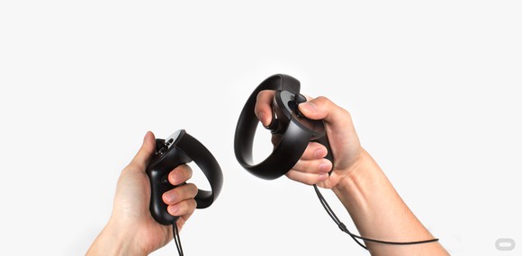 Oculus Rift hand controls being used by someone in VR.