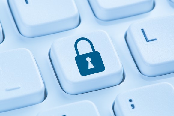 A padlock painted on a key on a keyboard