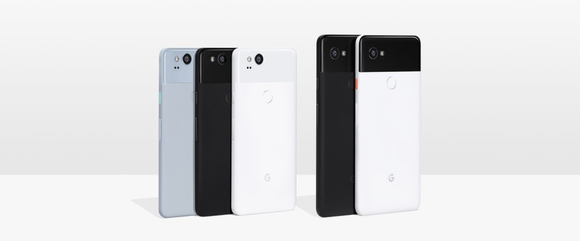 Different colors of Pixel 2 and Pixel 2 sitting vertically on a table