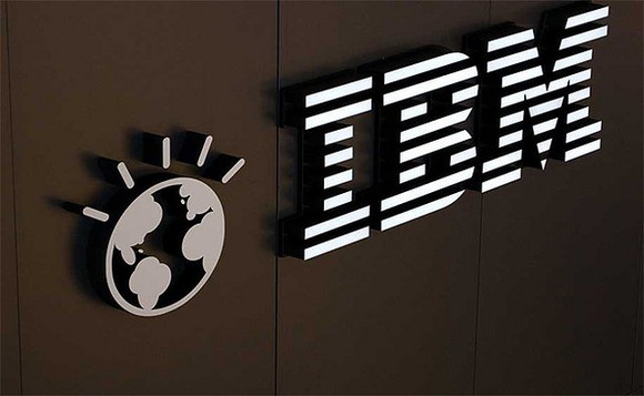 Close-up picture of the IBM logo and name on one of its offices.